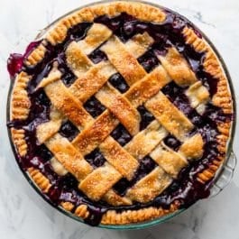 blueberry pie with lattice pie crust.