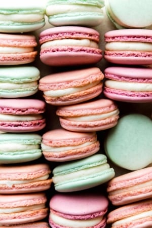 pink, purple, and aqua blue French macarons