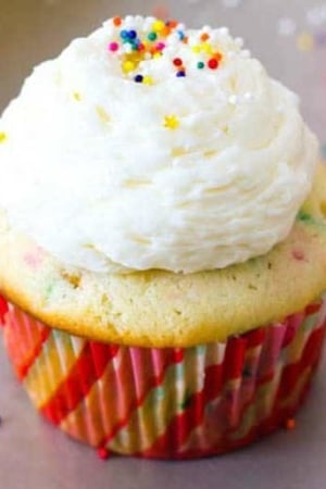 funfetti cupcake topped with vanilla buttercream and sprinkles