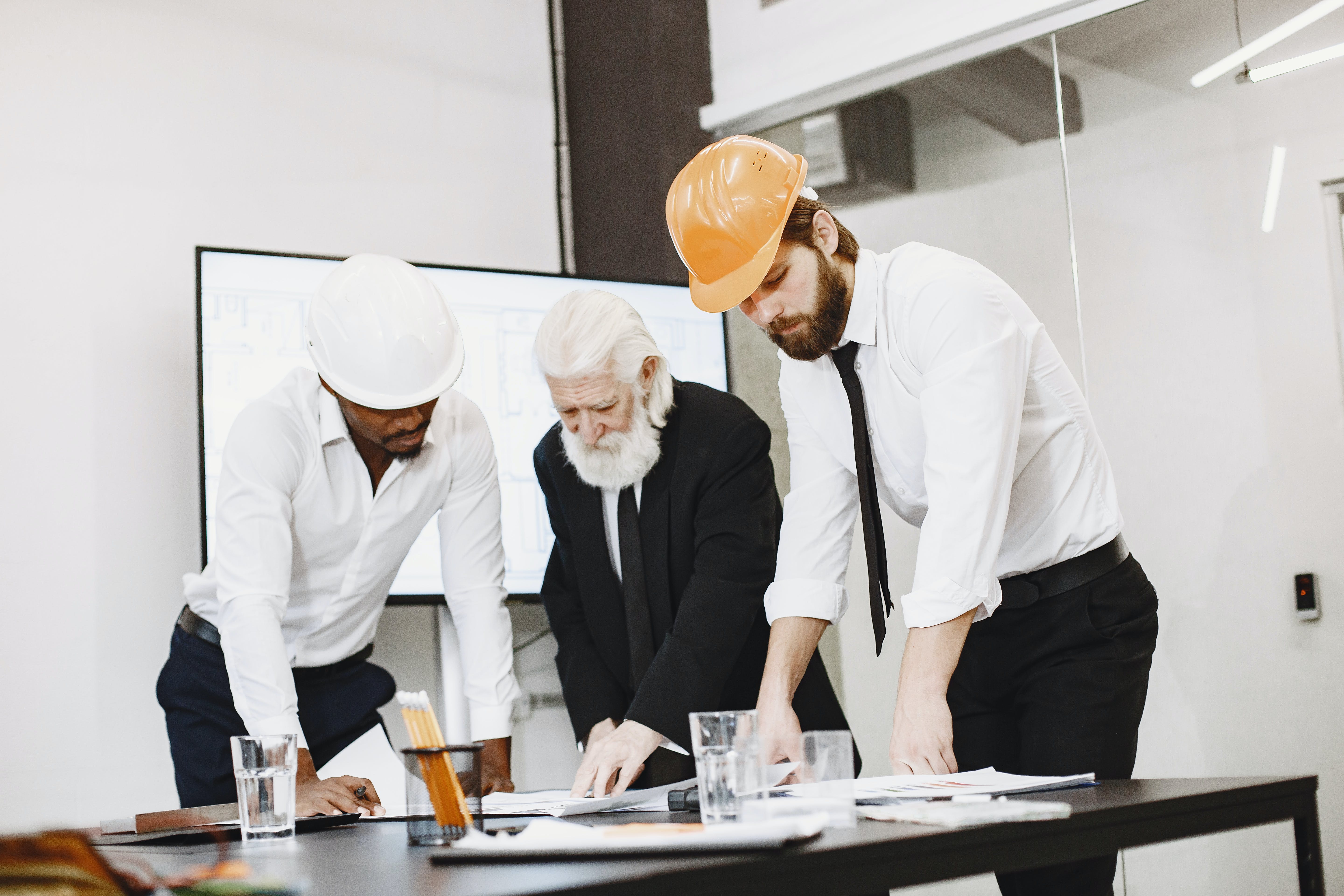 Workers viewing blueprints