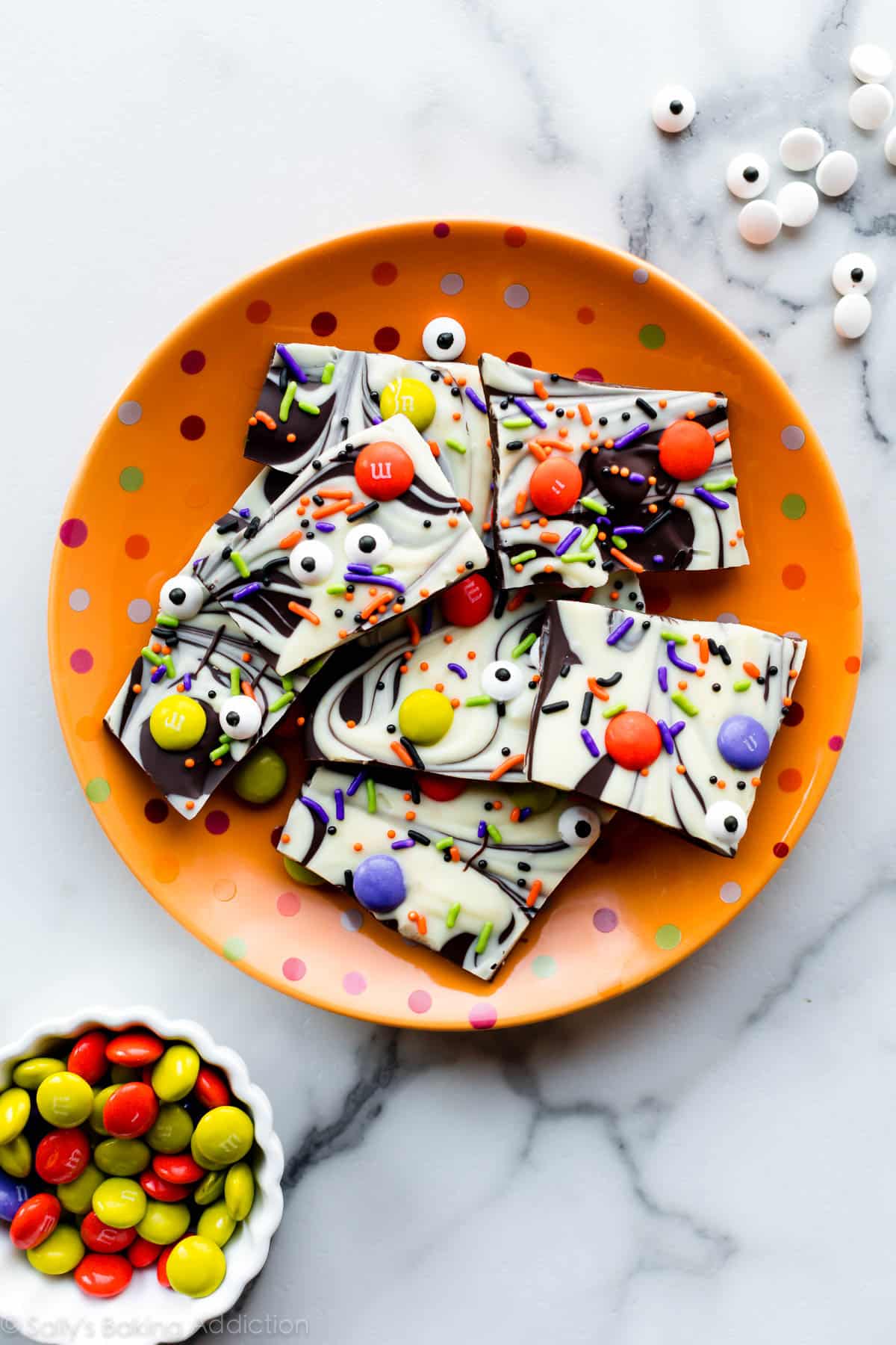 halloween chocolate bark on orange plate