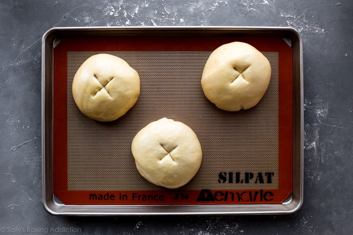 bread bowls on baking sheet before baking