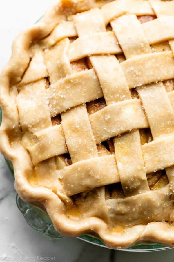 latticed pie crust top with egg wash and coarse sugar on top.