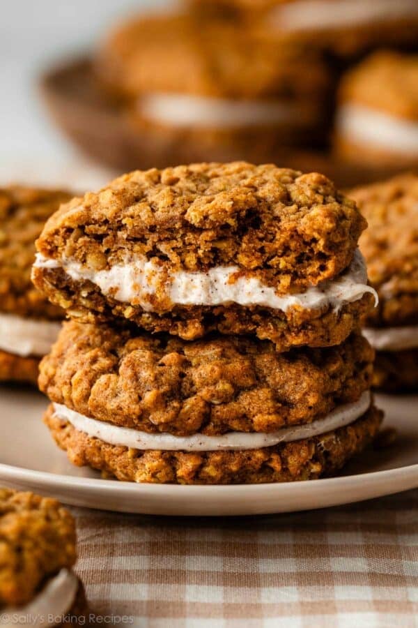 stack of 2 pumpkin oatmeal cream pie cookie sandwiches.