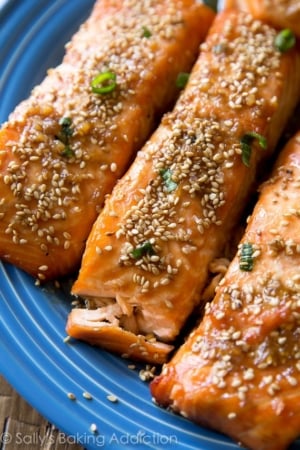 easy maple sesame salmon on a blue plate