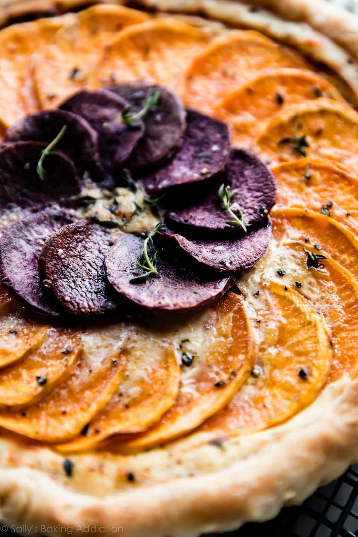 zoomed in image of vegetable and cheese tart after baking