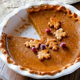 pumpkin pie with one slice missing