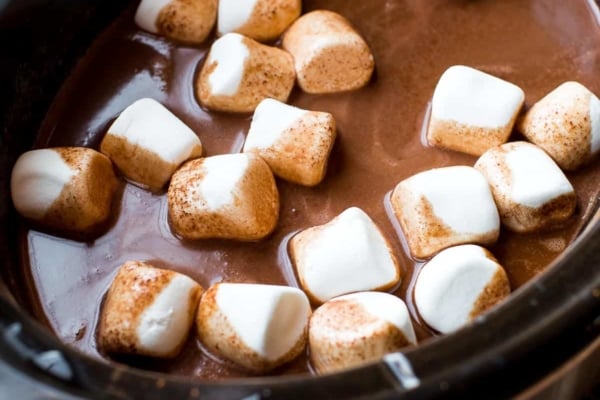 hot chocolate in a slow cooker with marshmallows