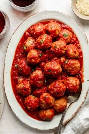 meatballs in marinara sauce on platter.