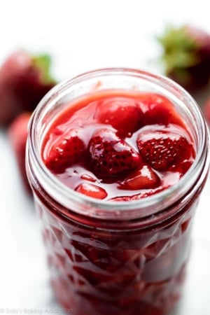 strawberry sauce dessert topping in glass jar