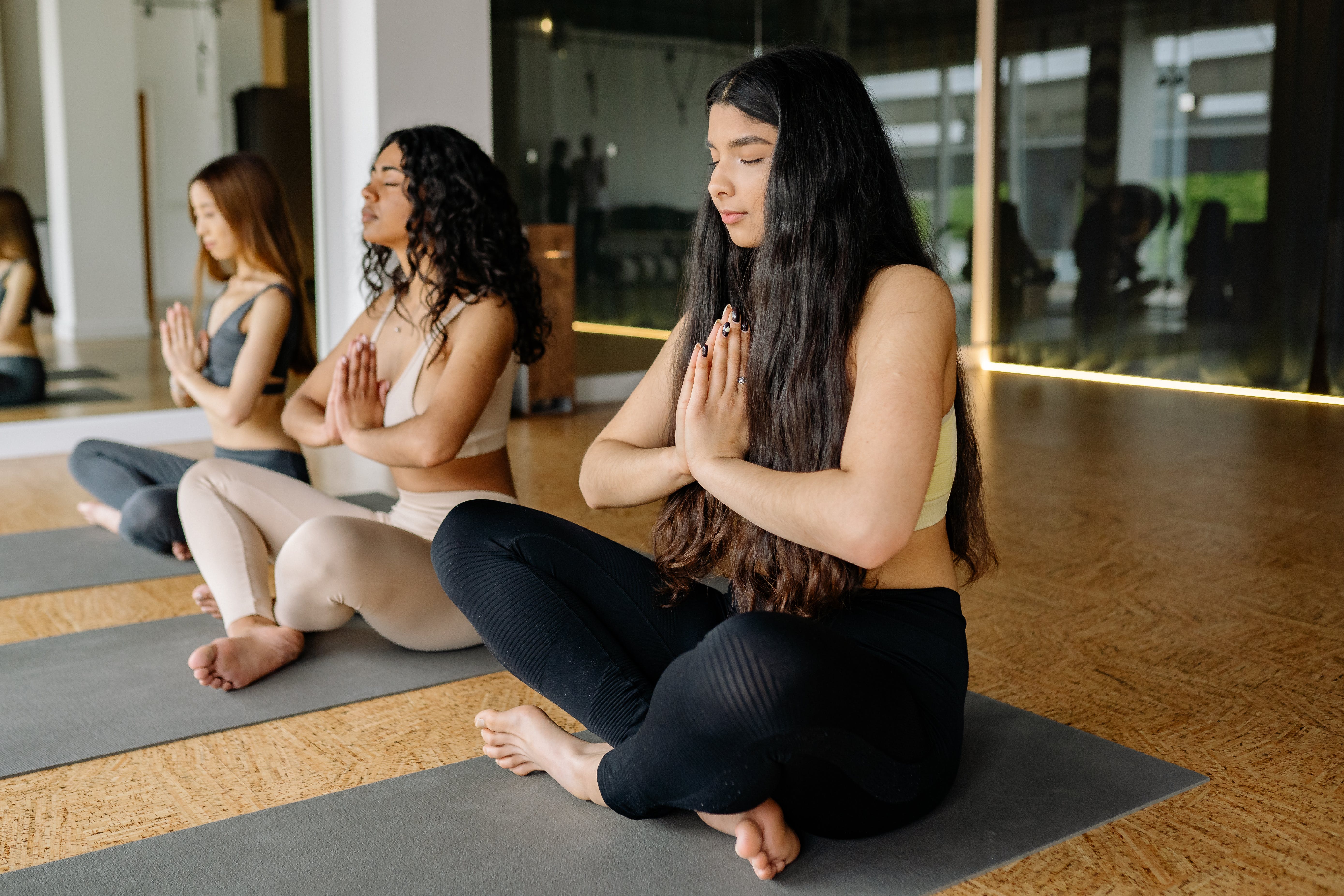 Three women anjali mudra